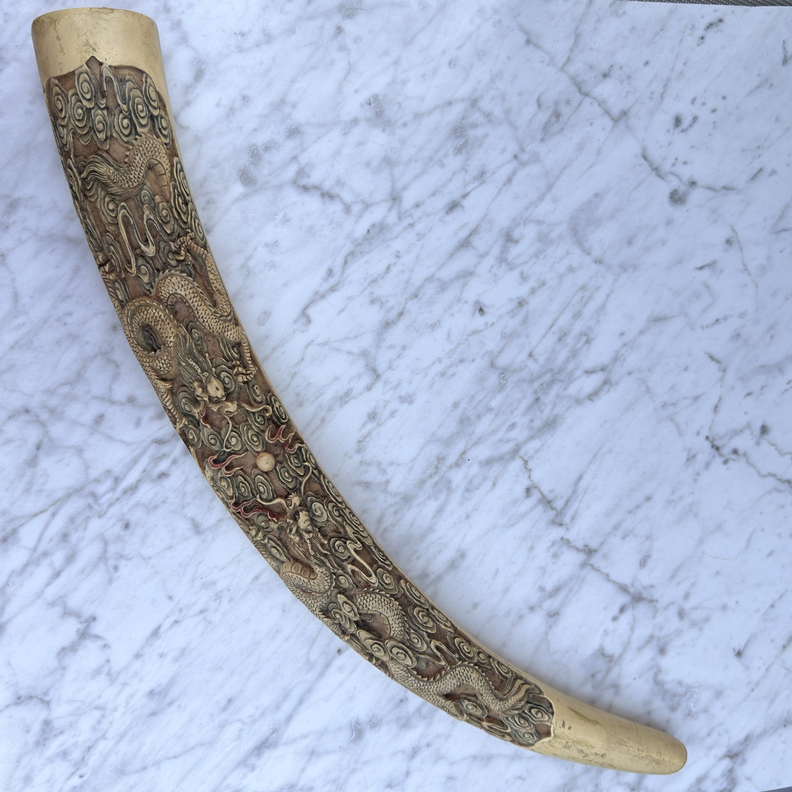 Man-Made, Not Ivory: Selling a Carved Tusk-Form Honestly